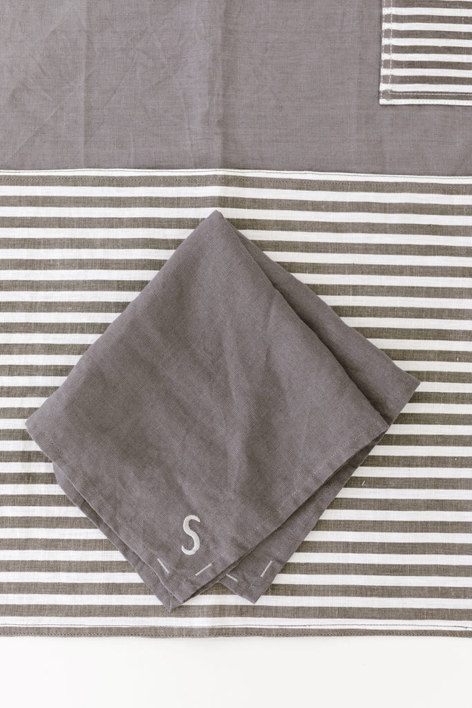 placesetting with Linen Placemat in Pewter Stripe